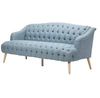 Custom Button Blue Fabric Arm Sofa in a Living Room